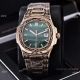 Clone Patek Philippe Nautilus Gold Tattoo Wrist Malachite Green Dial (5)_th.jpg